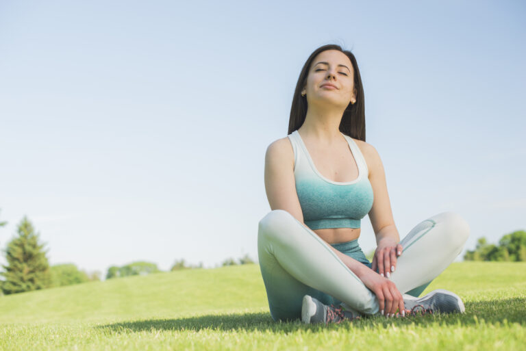 athletic-woman-practicing-yoga-outdoor