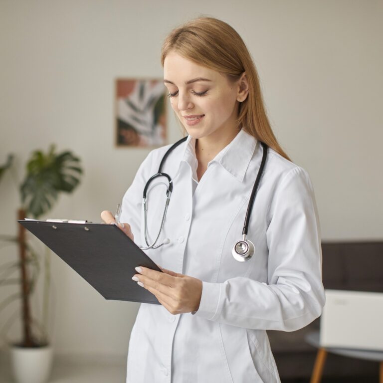 smiley-covid-recovery-center-female-doctor-holding-clipboard